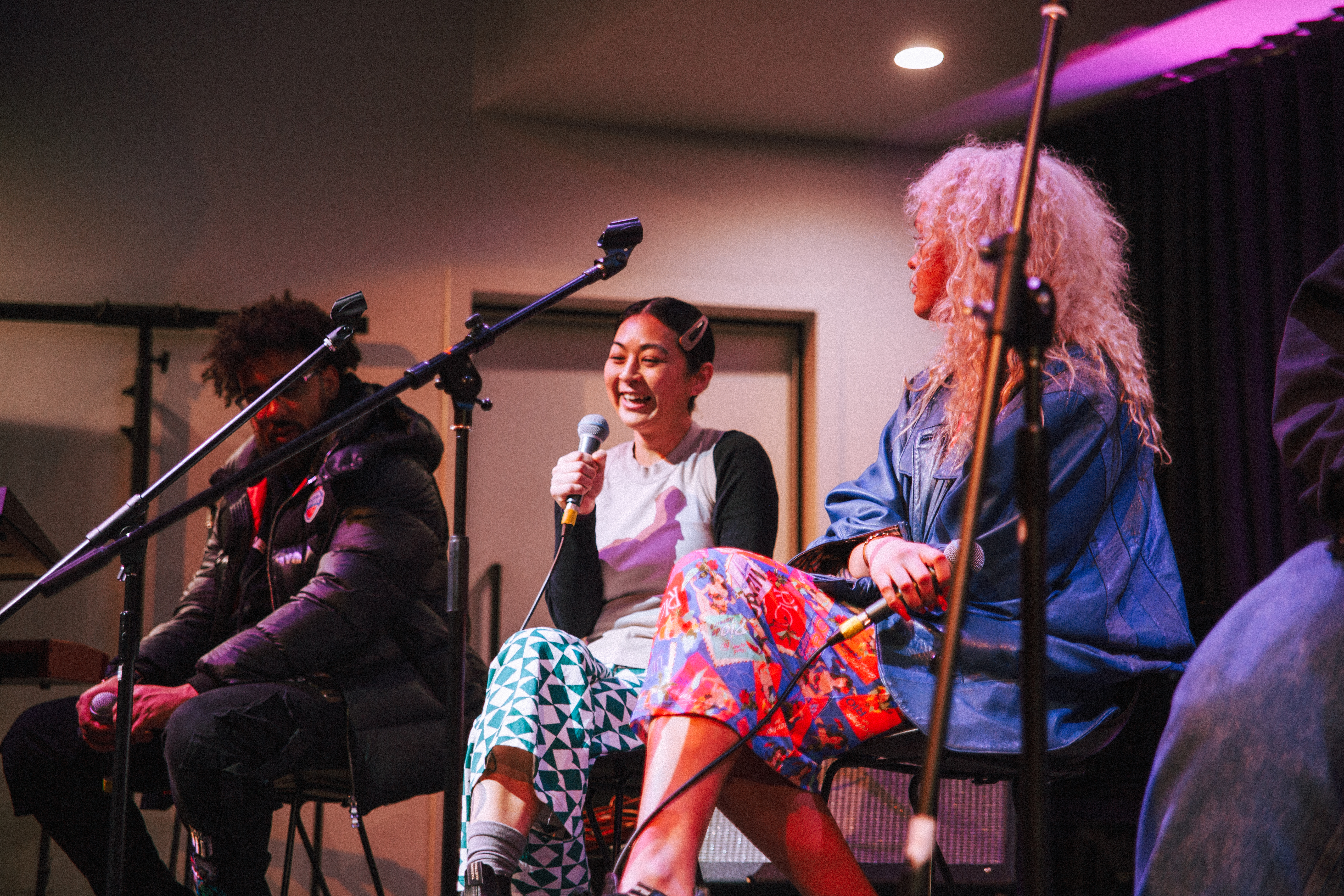 Three Collarts student musicians on stage talking about their experience at Open day 