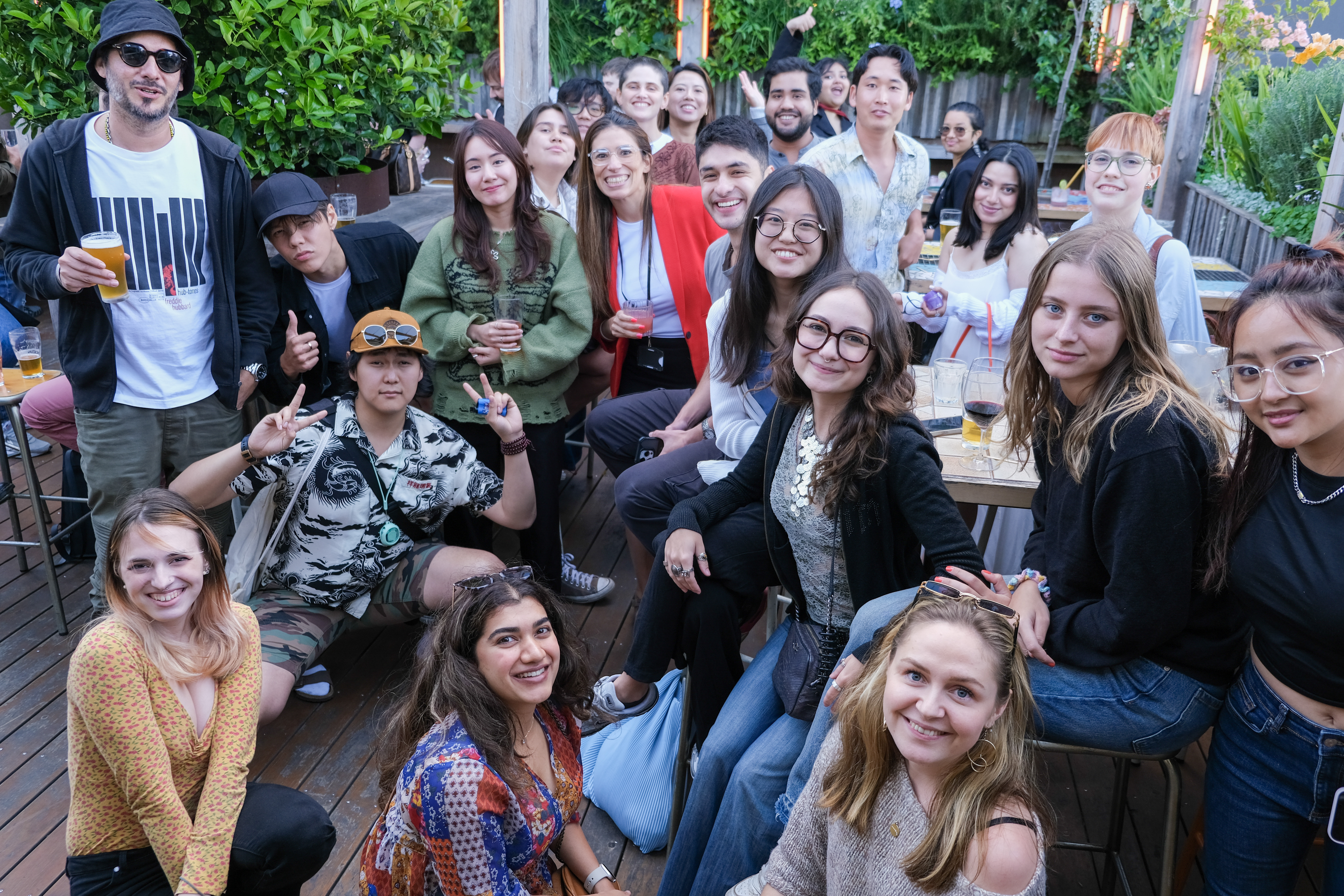 Group of international Collarts students smiling and posing 