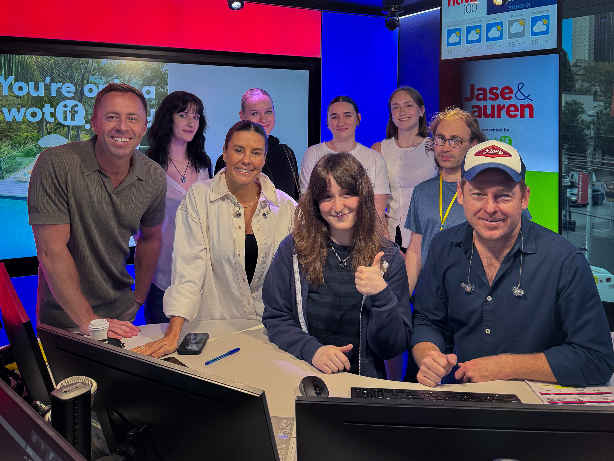 Group of Collarts journalism students smiling and sitting on the panel for NOVA radio 